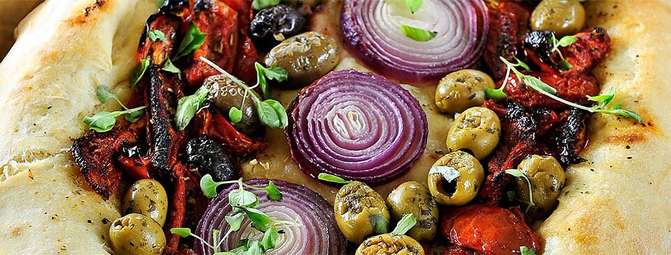 Filled bread with tomatoes and olives