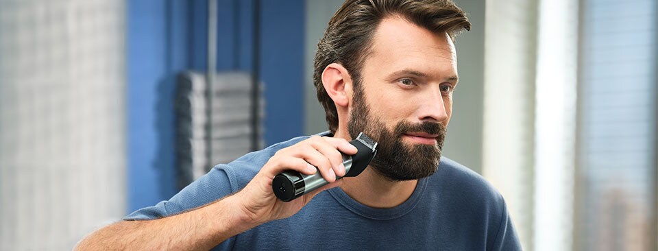 Man trimming his beard