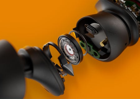 Close-up technical image showing inner parts of a true wireless headphones