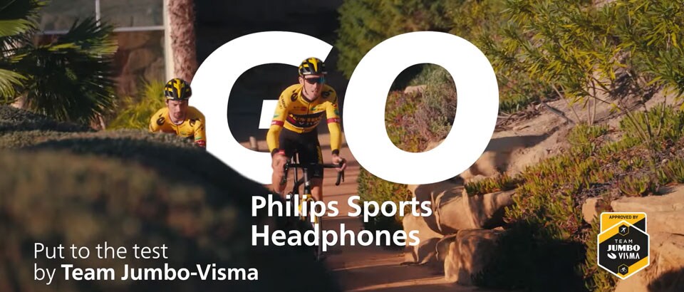 Two Team Jumbo-Visma athletes cycling outdoors