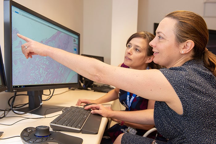 Download image (.jpg) Dr Lisa Browning and Professor Clare Verrill, Honorary Consultant in Cellular Pathology at Oxford University Hospitals working with Philips IntelliSite Pathology Solution�s Image Management System
